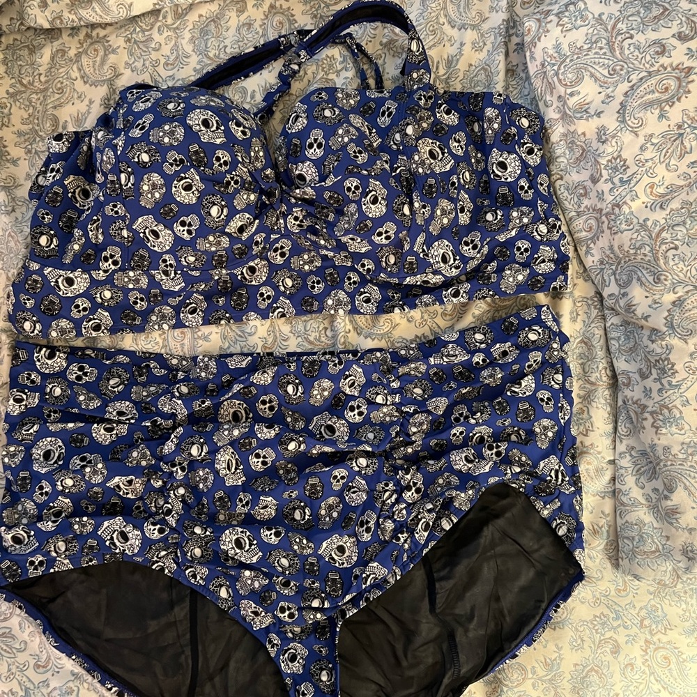 This is a barely worn 2 piece Torrid swim suit. I gave the measurements listed.